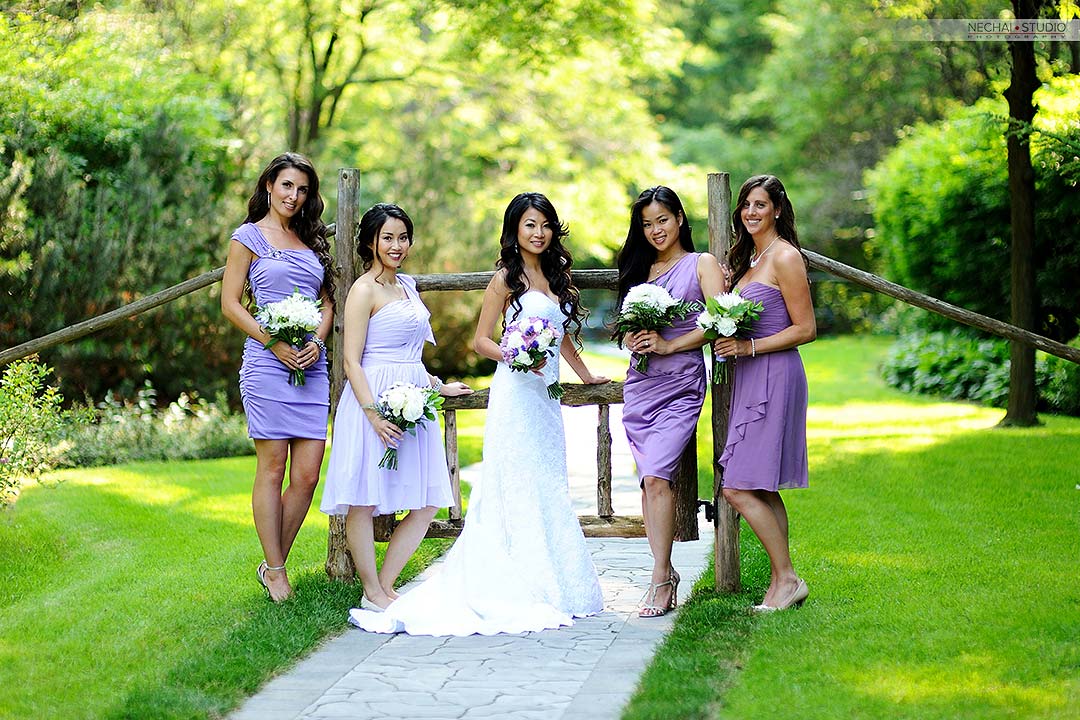 After-Bride with bridesmaids in purple dresses retouched photos